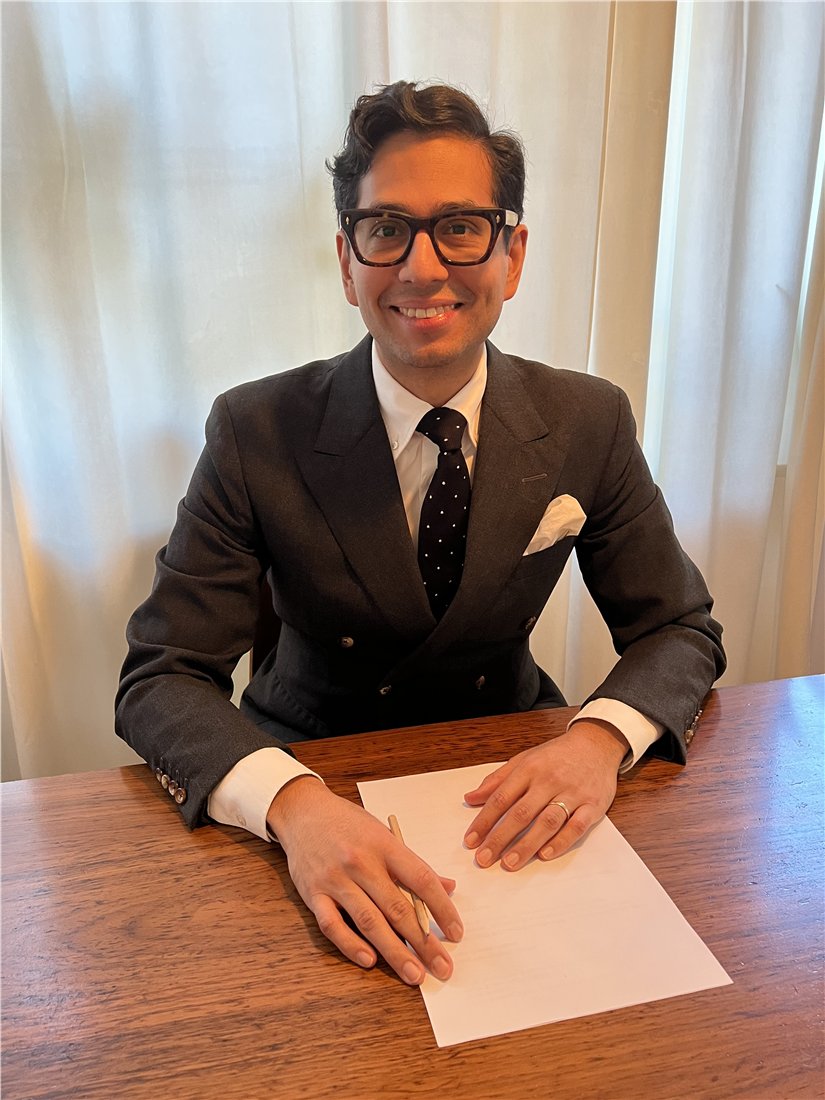 Simon Dicksved seated at his desk